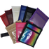 A collection of Flip Over Arm Bands in various solid colors and one with a multicolored reflective surface, designed to hold numbers for dog shows or training events.